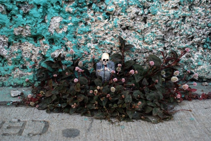 San Cristóbal de las Casas, México. Cement Eclipses -By Isaac Cordal 2013 in 2