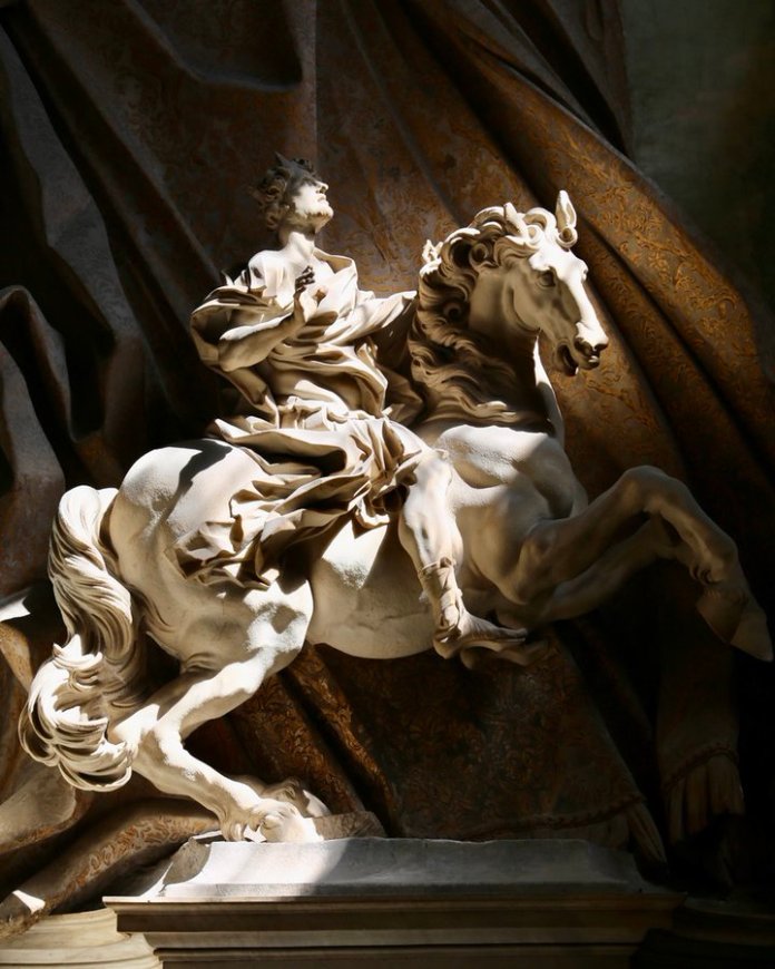 "The Vision of Constantine," a dynamic marble sculpture by Gian Lorenzo Bernini, depicting the Roman Emperor Constantine on a rearing horse, caught in a moment of divine revelation. The sculpture captures movement and tension, with Constantine gazing upwards, his robes dramatically flowing, and his horse poised with an expressive, intense posture. Bernini's skill is evident in the intricate details, from the horse’s muscles to Constantine's gesture of awe. The statue is set against a rich backdrop that adds depth, emphasizing Bernini's revolutionary technique in conveying motion and emotion in stone.
