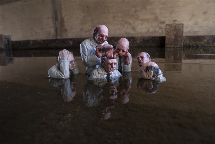 Brainwashed. Capitolia, CA. EEUU. Cement Eclipses -By Isaac Cordal 2013 in 4