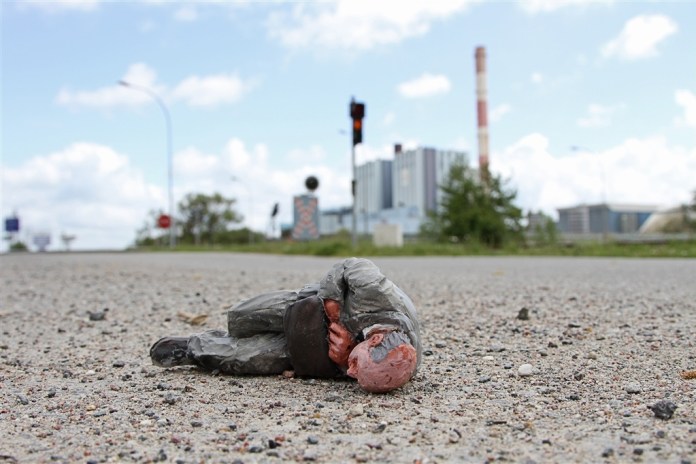 Cement Eclipses -By Isaac Cordal 2013 in 16