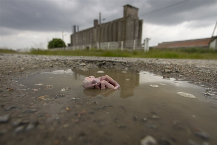 Nantes, France. Cement Eclipses -By Isaac Cordal 2013 in 11