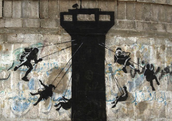 Street Art by Banksy in Gaza, Palestine 3