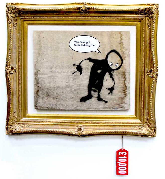Artwork titled 'You’ve Got To Be Kidding Me' from Banksy’s 'Banksy vs. Bristol Museum' exhibition at Bristol Museum in 2009. The piece shows a simplistic black figure with a surprised expression, holding a tiny version of itself in one hand, with a speech bubble that says, 'You have got to be kidding me.' The image is framed in an ornate gold frame with a red price tag hanging below, displaying £100,013, adding a layer of satire about the commercialization of art.