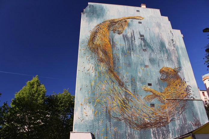 Street Art by Street Artist DALeast in Paris, France Cats Fighting