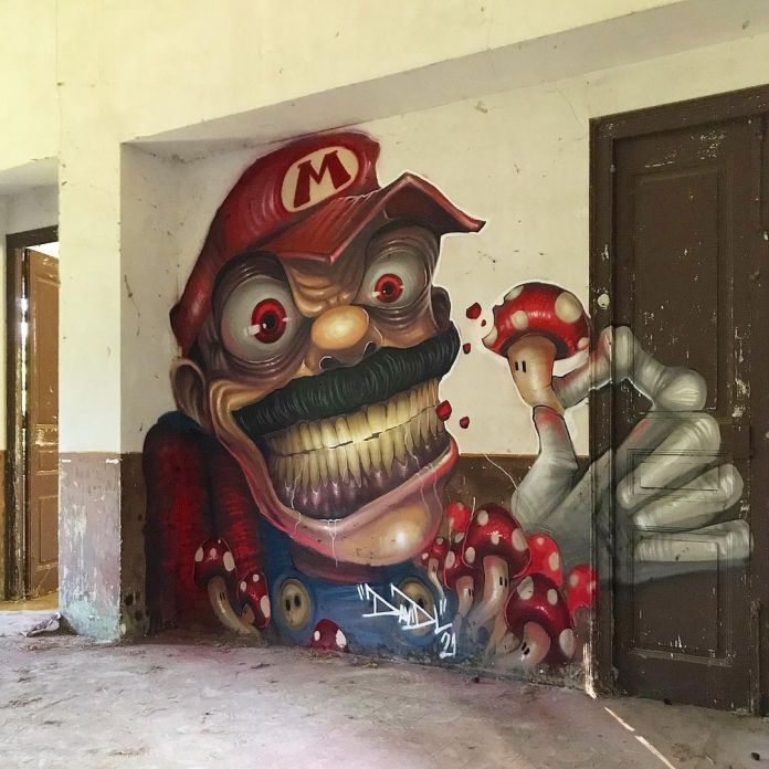 Post-graffiti artwork by DavidL featuring a sinister depiction of Super Mario with exaggerated features and a menacing grin, holding a mushroom, painted on a distressed wall, located outside Barcelona, Spain.