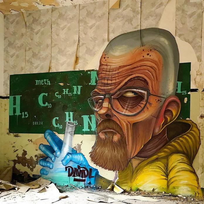 Post-graffiti artwork by DavidL featuring Walter White from Breaking Bad, holding a flask, with chemical formulas in the background, painted on a distressed wall, located outside Barcelona, Spain.