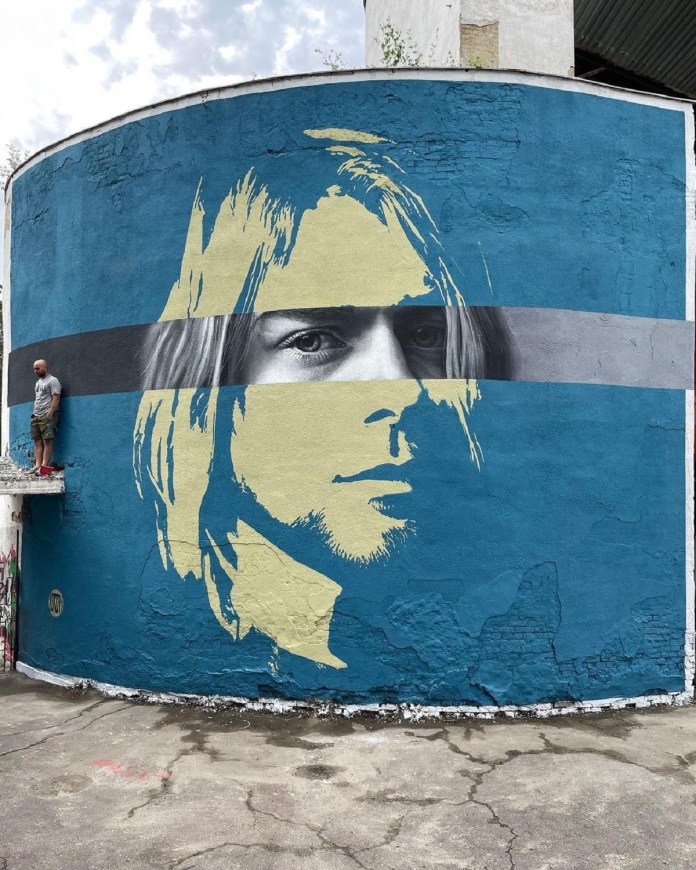 A lifelike mural of Kurt Cobain by Sasha Korban, capturing the intensity and emotion of the legendary Nirvana frontman, located on a wall in Sumy, Ukraine.