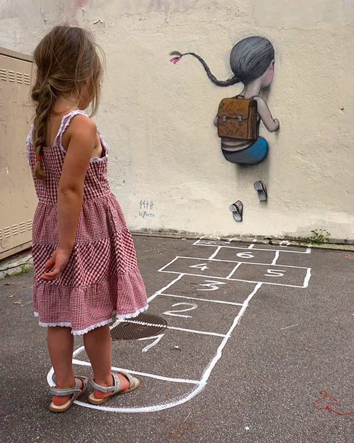 A child in a red-checkered dress stands on a real hopscotch course, looking at a mural by Seth Globepainter showing a painted girl mid-jump into a white wall. The scene is set in La Butte aux Cailles, Paris.