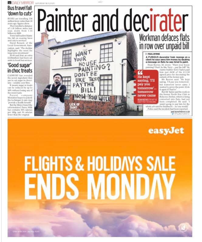 A newspaper page titled “Painter and Decirater” featuring Dean Reeves standing in front of a cream-colored building with his graffiti message in bold black paint: "Want your house painting? Don’t be like Terry, pay the bill! Now you will!" The article discusses the dispute and Reeves’ act of defiance.