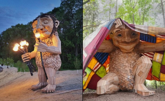 Side-by-side photo of two large wooden troll sculptures by Thomas Dambo. On the left, a troll named Mama Rosa in Wauwatosa, USA holds glowing streetlamps at dusk, standing on a sandy path near a wooded area. On the right, a troll crouches beneath a bright patchwork tent made of colorful fabric in a forest, smiling with arms stretched wide.