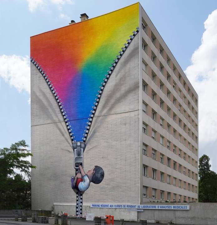 Mural by Seth Globepainter in Le Mans, France, showing a child figure pulling down a massive zipper on a tall building to reveal a rainbow-colored sky beneath the surface.
