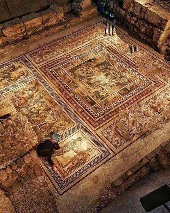 The world’s largest ancient mosaic, covering 9,000 square feet in Antakya, Turkey, with elaborate geometric designs and wave-like patterns, preserved within The Museum Hotel Antakya.