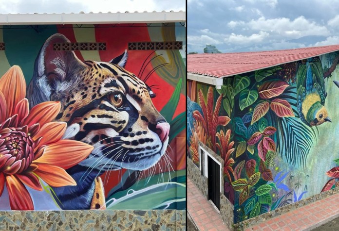 Split image showing two sides of a vibrant mural in Barcelona, Colombia. On the left, a close-up of an ocelot's face with lifelike fur patterns and expressive amber eye, surrounded by bright orange petals and a colorful jungle background. On the right, the corner of the building features a green and yellow bird in flight, surrounded by lush tropical leaves in deep reds, purples, and greens, with soft mountains and clouds in the background.
