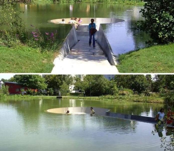 Two views of a sunken concrete path leading through a lake to a circular platform. The bench is surrounded by water but reachable on foot, creating an optical illusion of submersion.