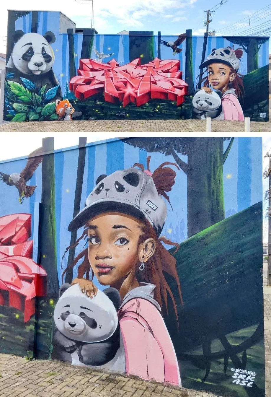 Mural by Jhon Robert in Curitiba, Brazil showing a young girl in a panda-themed hat hugging a panda plush, flanked by a giant panda, a red panda, and birds in a stylized forest with blue vertical tree trunks and glowing fireflies.