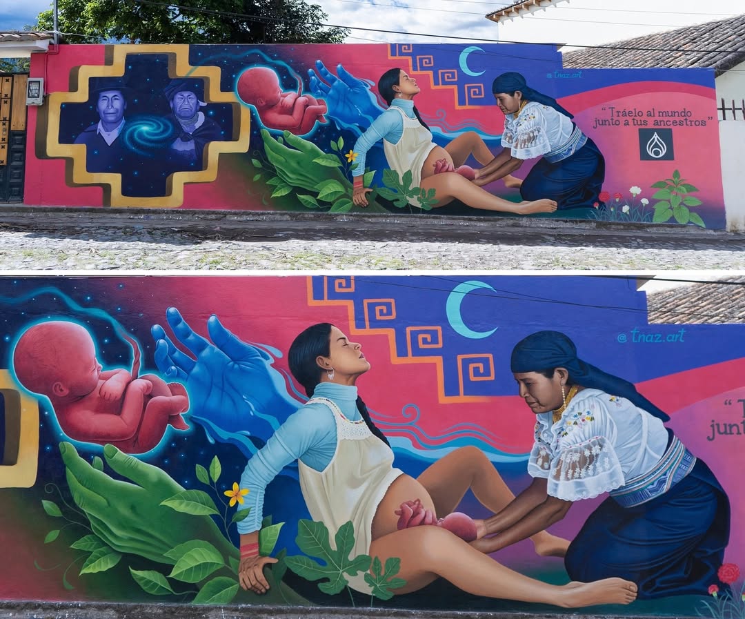 A vibrant mural by Alvaro Córdova in Cotacachi, Ecuador, depicting an Indigenous woman giving birth with the assistance of a midwife in traditional clothing. The scene is rich with symbolism, featuring a glowing unborn baby floating in the cosmos, ancestral faces within a starry cross-shaped portal, and large protective hands emerging from the earth. The background showcases geometric Andean patterns, a crescent moon, and a swirling river, all reinforcing themes of heritage, spirituality, and the sacred act of bringing life into the world.
