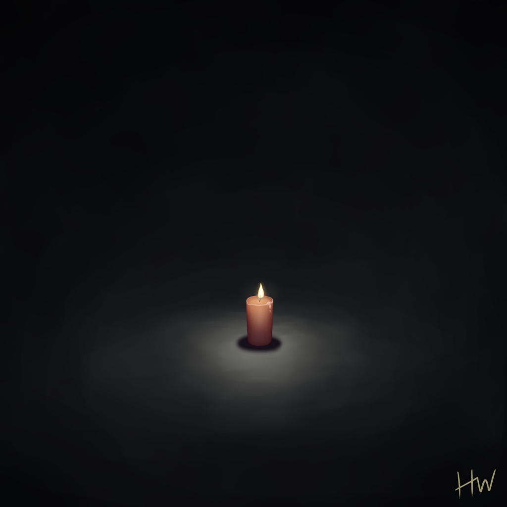 A lit candle on the ground in absolute darkness, giving off some light.