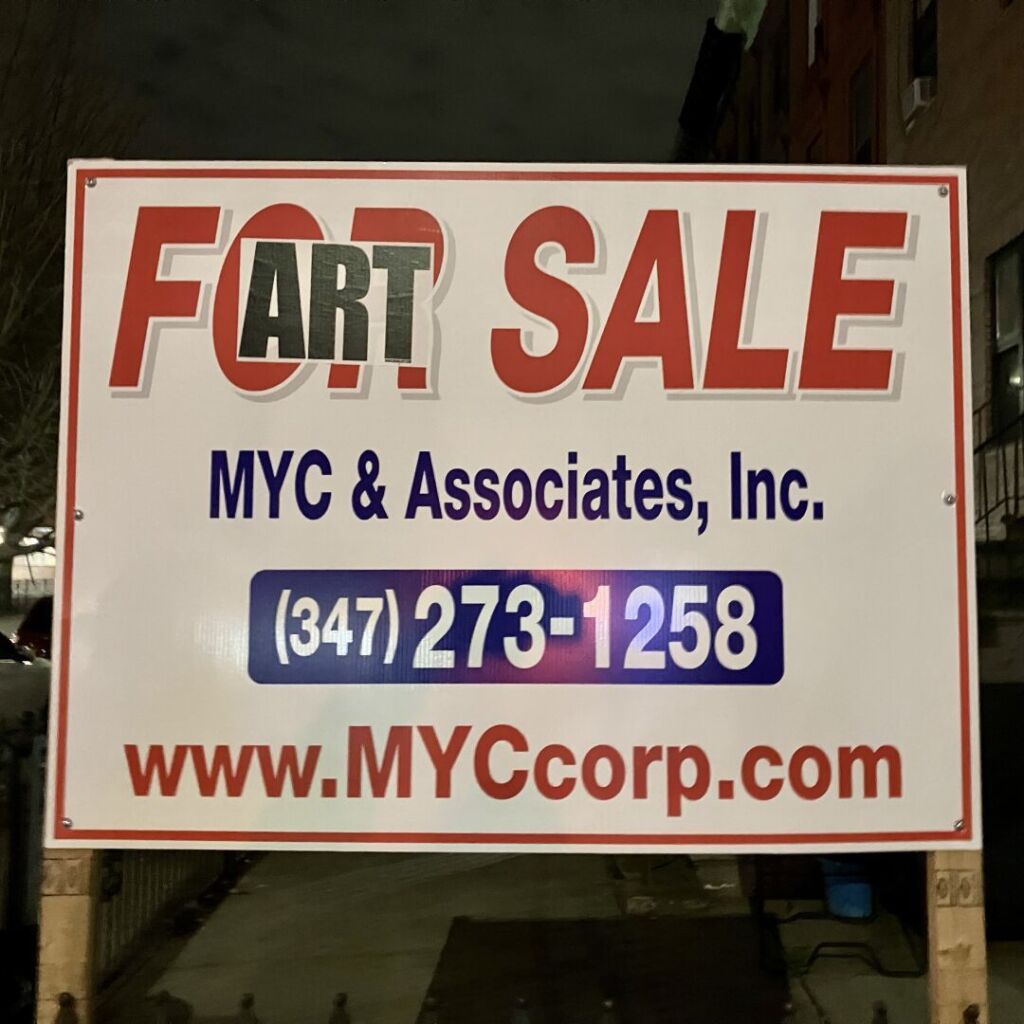 A real estate “For Sale” sign adorned with an “ART” sticker make the sign read “Fart Sale”