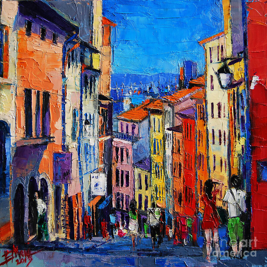 Very colourful painting of a street in Lyon, France. The street is paved with bright blue tiles. There are many colourful people walking in the street. On both sides of the street are high colourful houses. The colours used are yellow, orange, purple, blue, red and pink. The sky is clear bright blue.