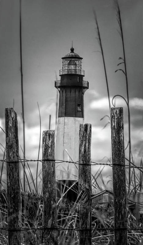 Tybee Island Lighthouse near Charleston, vertical in black and white here:

https://fineartamerica.com/featured/tybee-island-lighthouse-in-vertical-norma-brandsberg.html 