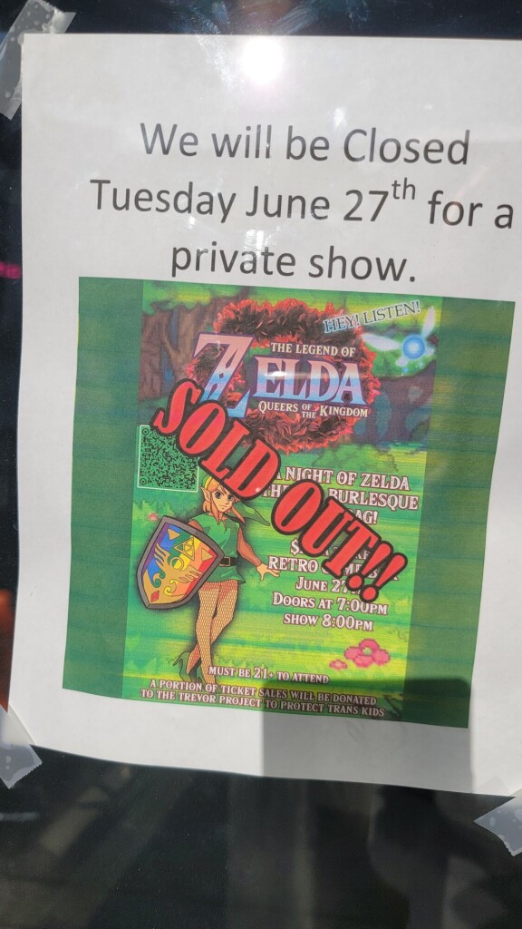 photo of the drag show poster, with "sold out" over it in big font