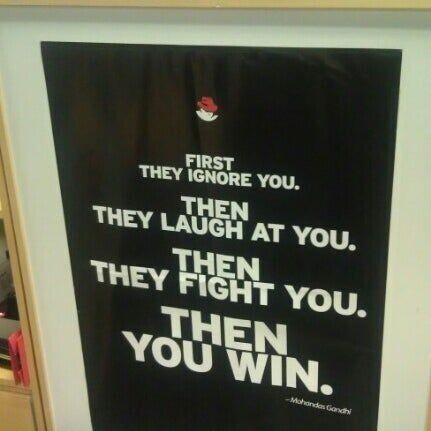 Photograph of a Red Hat poster showing the misattributed quote.