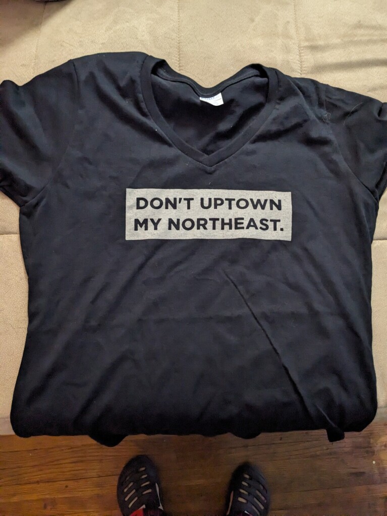 Black t shirt that says don't uptown my northeast 