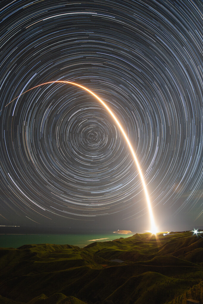 2024 August 17

Sky Full of Arcs
 * Image Credit & Copyright: Rory Gannaway

Explanation: 
On August 11 a Rocket Lab Electron rocket launched from a rotating planet. With a small satellite on board its mission was dubbed A Sky Full of SARs (Synthetic Aperture Radar satellites), departing for low Earth orbit from Mahia Peninsula on New Zealand's north island. The fiery trace of the Electron's graceful launch arc is toward the east in this southern sea and skyscape, a composite of 50 consecutive frames taken over 2.5 hours. Fixed to a tripod, the camera was pointing directly at the South Celestial Pole, the extension of planet Earth's axis of rotation in to space. But no bright star marks that location in the southern hemisphere's night sky. Still, the South Celestial Pole is easy to spot. It lies at the center of the concentric star trail arcs that fill the skyward field of view. 

Authors & editors: Robert Nemiroff (MTU) & Jerry Bonnell (UMCP)
NASA Official: Amber Straughn Specific rights apply.
NASA Web Privacy, Accessibility Notices
A service of: ASD at NASA / GSFC,
NASA Science Activation
& Michigan Tech. U.