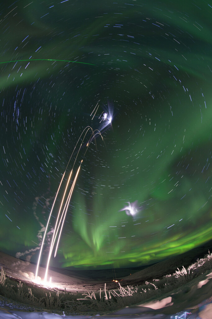 2015 January 30

A Night at Poker Flat
 * Image Credit: NASA / Jamie Adkins

Explanation: 
Four NASA suborbital sounding rockets leapt into the night on January 26, from the University of Alaska's Poker Flat Research Range. This time lapse composite image follows all four launches of the small, multi-stage rockets to explore winter's mesmerizing, aurora-filled skies. During the exposures, stars trailed around the North Celestial Pole, high above the horizon at the site 30 miles north of Fairbanks, Alaska. Lidar, beams of pulsed green lasers, also left traces through the scene. Operating successfully, the payloads lofted were two Mesosphere-Lower Thermosphere Turbulence Experiments (M-TeX) and two Mesospheric Inversion-layer Stratified Turbulence (MIST) experiments, creating vapor trails at high altitudes to be tracked by ground-based observations. 

Authors & editors: Robert Nemiroff (MTU) & Jerry Bonnell (UMCP)
NASA Official: Phillip Newman Specific rights apply.
NASA Web Privacy Policy and Important Notices
A service of: ASD at NASA / GSFC
& Michigan Tech. U.