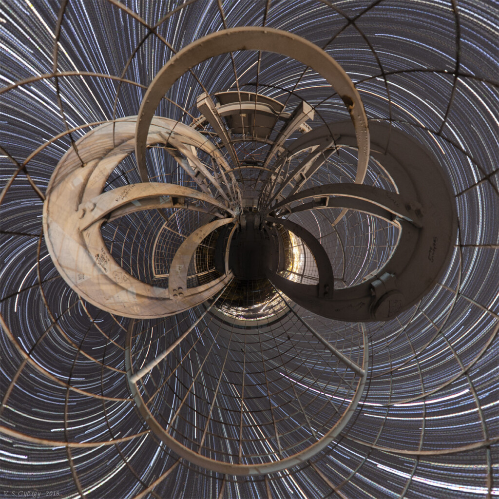 2018 November 9

Little Planet Lookout
* Image Credit & Copyright: Gyorgy Soponyai

Explanation: 
Don't panic. This little planet projection looks confusing, but it's actually just a digitally warped and stitched, nadir centered mosaic of images that covers nearly 360x180 degrees. The images were taken on the night of October 31 from a 30 meter tall hill-top lookout tower near Tatabanya, Hungary, planet Earth. The laticed lookout tower construction was converted from a local mine elevator. Since planet Earth is rotating, the 126 frames of 75 second long exposures also show warped, concentric star trails with the north celestial pole at the left. Of course at this location the south celestial pole is just right of center but below the the little planet's horizon. 

Authors & editors: Robert Nemiroff (MTU) & Jerry Bonnell (UMCP)
NASA Official: Phillip Newman Specific rights apply.
NASA Web Privacy Policy and Important Notices
A service of: ASD at NASA / GSFC
& Michigan Tech. U.