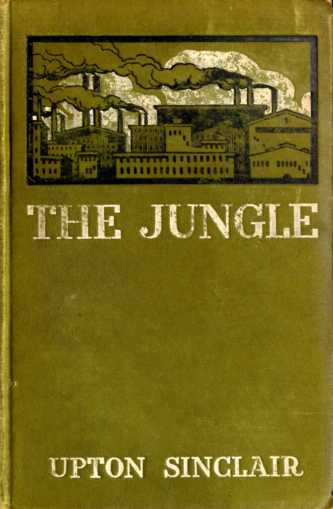 Front cover of The Jungle (1906), written by Upton Sinclair and published by Doubleday, Page & Company. Image shows buildings with smokestacks spewing smoke. By Unknown author - This file has been extracted from another file, Public Domain, https://commons.wikimedia.org/w/index.php?curid=90013862