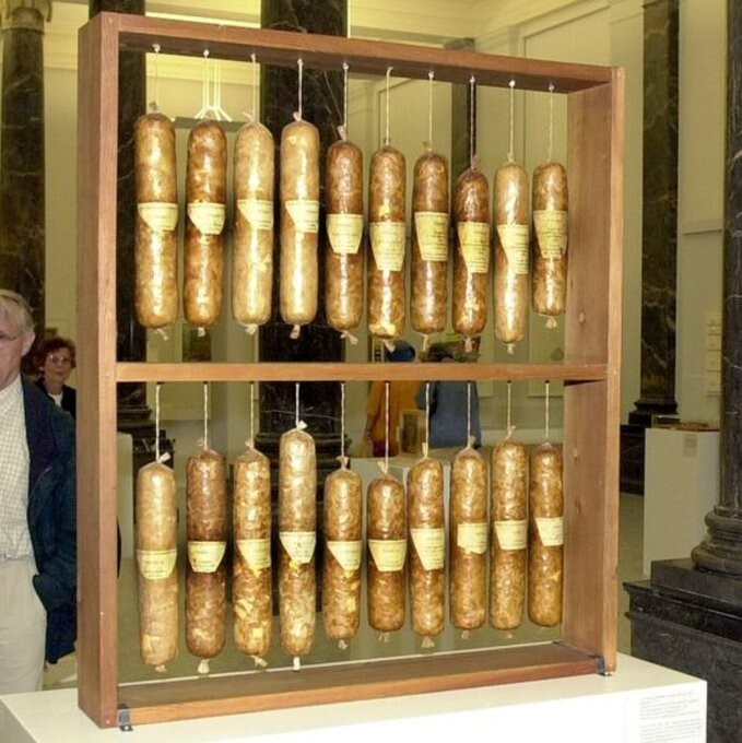Dieter Roth's "literature sausages" in an exhibition: Hegel's complete work looking like 20 sausages.