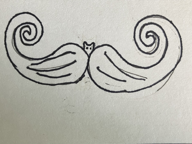 A black market illustration of a tiny cat head with a relatively giant mustache that curls on each side.