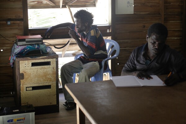 The Climate Refugees of the Carteret Islands in Papua New Guinea only have a rusty radio powered by battery to communicate with the outside world.