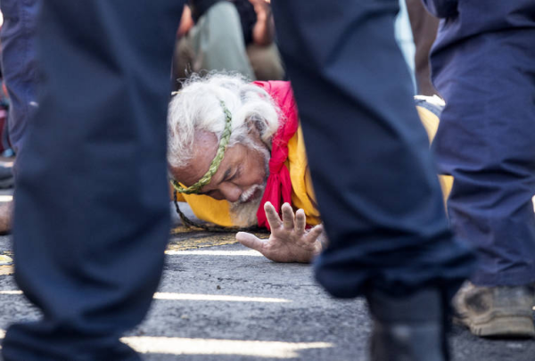 Native Hawaiian being arrested by US police