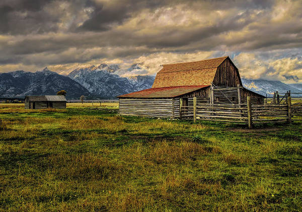 Teton Moulton Barn in the valley of the Grand Teton Mountains in it's backyard. Once a working ranch, it now serves as a foreground interest point for photographers taking photos of the mountains behind.