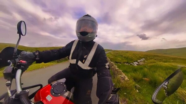 Motorcyclist riding through the countryside 