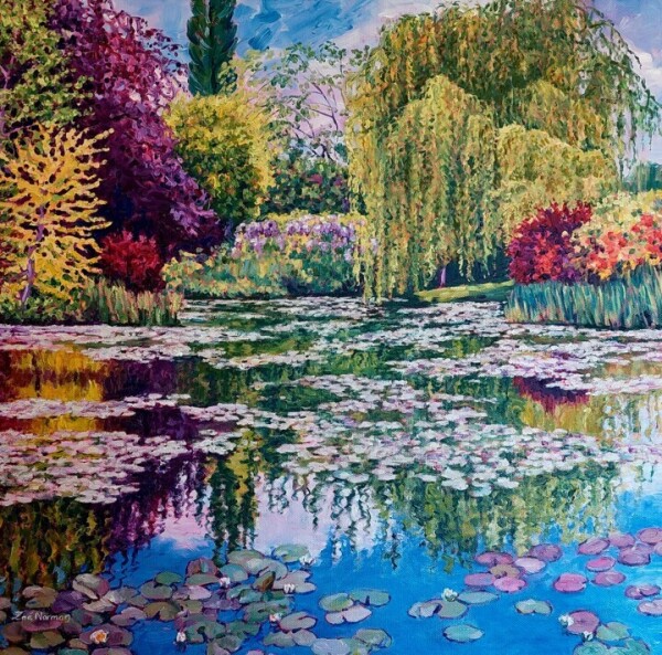 Colourful paintng of a blue pont in nature, with a lot of colourful foliage, flowers and trees in the background. Their colours are reflected in the pond. There are many light pink, purple and green leaves on the water. On the shore in the background are  a yellow, a purple and a large green coloured tree. There are two dark pink bushes, and a light green bush with pink and yellow flowers in it. On the right is some high turquoise grass. In the middle the soil is green and yellow, with purple flowers on it. The sky is coloured blue and light pink.