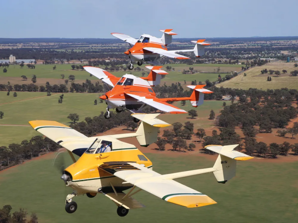 Three Transavia AirTruks in formation. They are weird squat airplanes with two tailbooms each.