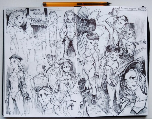 Another photo of my sketchbook, a double page with ballpen sketches, many things are going on: mostly Cammy from various view angle, portraits here and there too. 