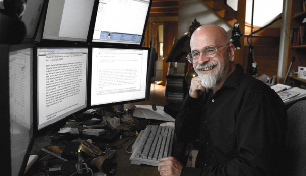 Terry Pratchett with 6 monitors