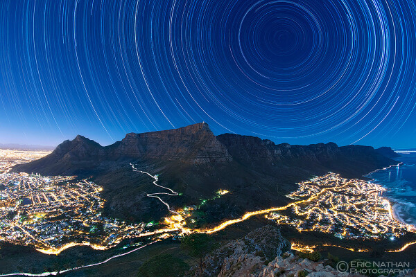 2015 June 25

Star Trails above Table Mountain
 * Image Credit & Copyright: Eric Nathan

Explanation: 
Stars trail above and urban lights sprawl below in this moonlit nightscape from Cape Town, South Africa, planet Earth. The looming form of Table Mountain almost seems to hold terrestrial lights at bay while the stars circle the planet's South Celestial Pole. This modern perspective on the natural night sky was captured in June 2014, the scene composed of over nine hundred, stacked 30 second exposures. The stunning result was chosen as the winner in the Against the Lights category, a selection from over 800 entries in The World at Night's 2015 International Earth and Sky Photo Contest. 

Authors & editors: Robert Nemiroff (MTU) & Jerry Bonnell (UMCP)
NASA Official: Phillip Newman Specific rights apply.
NASA Web Privacy Policy and Important Notices
A service of: ASD at NASA / GSFC
& Michigan Tech. U.