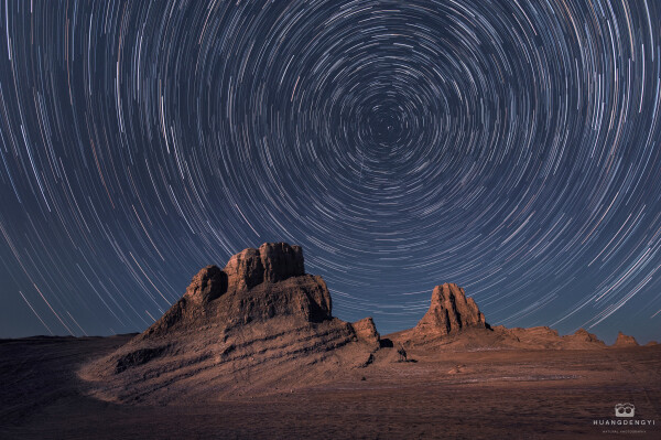 2019 November 30

Star Trails for a Red Planet
 * Image Credit & Copyright: Dengyi Huang

Explanation: 
Does Mars have a north star? In long exposures of Earth's night sky, star trails make concentric arcs around the north celestial pole, the direction of our fair planet's axis of rotation. Bright star Polaris is presently the Earth's North Star, close on the sky to Earth's north celestial pole. But long exposures on Mars show star trails too, concentric arcs about a celestial pole determined by Mars' axis of rotation. Tilted like planet Earth's, the martian axis of rotation points in a different direction in space though. It points to a place on the sky between stars in Cygnus and Cepheus with no bright star comparable to Earth's north star Polaris nearby. So even though this ruddy, weathered landscape is remarkably reminiscent of terrain in images from the martian surface, the view must be from planet Earth, with north star Polaris near the center of concentric star trails. The landforms in the foreground are found in Qinghai Province in northwestern China. 

Authors & editors: Robert Nemiroff (MTU) & Jerry Bonnell (UMCP)
NASA Official: Phillip Newman Specific rights apply.
NASA Web Privacy Policy and Important Notices
A service of: ASD at NASA / GSFC
& Michigan Tech. U.
