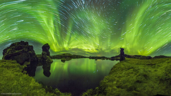 2015 May 18

Auroras and Star Trails over Iceland
 * Image Credit & Copyright: Vincent Brady

Explanation: 
It was one of the quietest nights of aurora in weeks. Even so, in northern- Iceland during last November, faint auroras lit up the sky every clear night. The featured 360-degree panorama is the digital fusion of four wide-angle cameras each simultaneously taking 101 shots over 42 minutes. In the foreground is serene Lake Myvatn dotted with picturesque rock formations left over from ancient lava flows. Low green auroras sweep across the sky above showing impressive complexity near the horizon. Stars far in the distance appear to show unusual trails -- as the Earth turned -- because early exposures were artificially faded. 

Authors & editors: Robert Nemiroff (MTU) & Jerry Bonnell (UMCP)
NASA Official: Phillip Newman Specific rights apply.
NASA Web Privacy Policy and Important Notices
A service of: ASD at NASA / GSFC
& Michigan Tech. U.